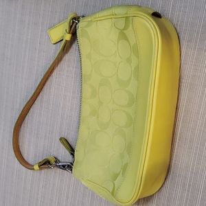 Coach wristlet with strap. Citron.